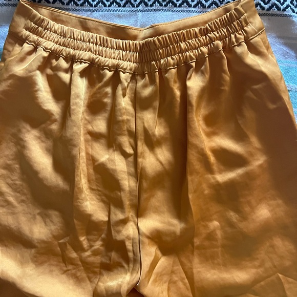 House of Harlow x Revolve matching gold satin set wide leg pants button up top. - Picture 6 of 8